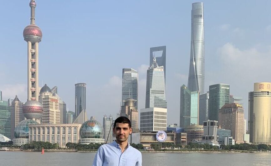 Pasquale Pometti in Shanghai, standing on the Bund in front of Pudong