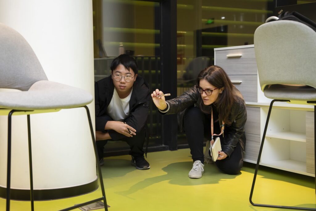 a Polimi professor guides a Joint School student during a class of "basic design sketch" in the Milan building